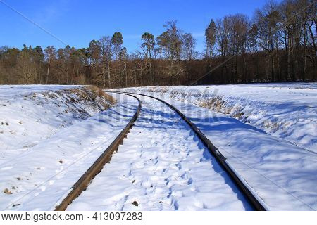 Railway Tracks Run Straight Away From The Viewer