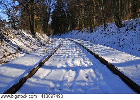 Railway Tracks Run Straight Away From The Viewer
