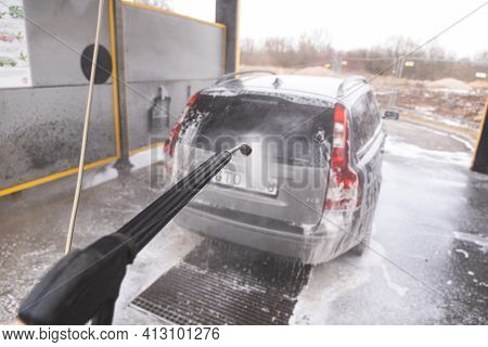 Contactless  Car Wash Self Service System. Washing Dirty Car In Car Wash Station With Foam