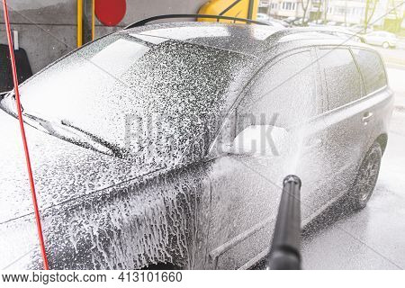Contactless  Car Wash Self Service System. Washing Dirty Car In Car Wash Station With Foam