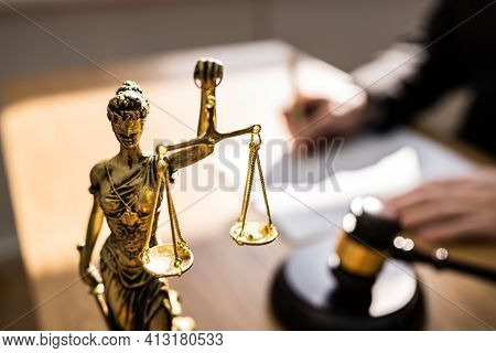 Judge With Gavel In Court Writing Legal Law Order