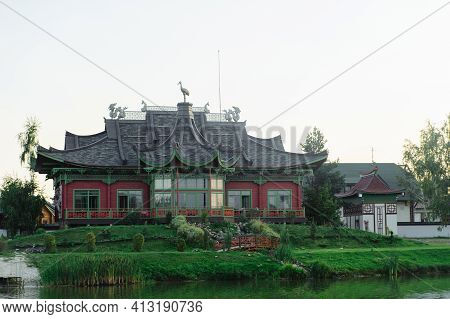 Expensive Building In The Chinese Style On The Bank Ov The River. Brech Complex, Chernihiv Region