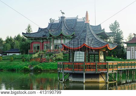 Building And Summer House In The Chinese Style Over The River. Brech Complex, Chernihiv Region