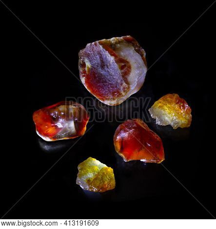 Set Of Agate Minerals From Novy Urengoy, Russia. A Backlight Photo Of Stone Isolated On Black.