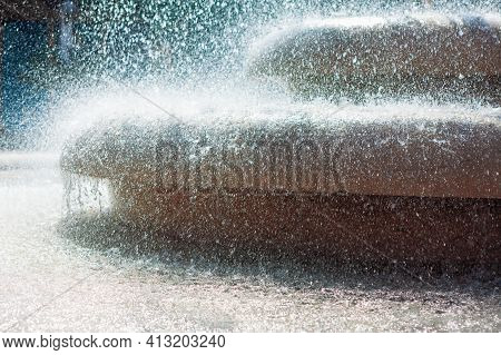 Dense Water Splashing Of Fountain In The Sunlight