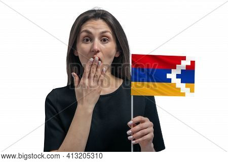 Happy Young White Woman Holding Flag Of Nagorno-karabakh Republic And Covers Her Mouth With Her Hand