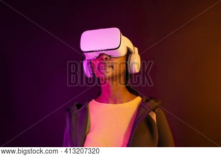 African American woman in virtual reality glasses smart technology