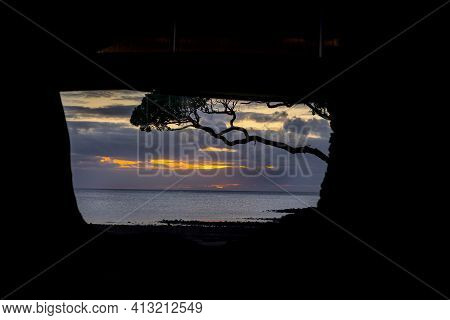 View Of Mulberry Grove Beach At Sunset Of Tryphena Harbour On Great Barrier New Zealand. Through Sil