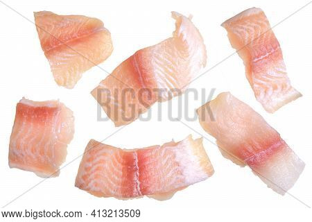 Pangasius Fish Fillet, Pieces On A Green Lettuce Leaf. Isolated On A White Background. Fresh Fish Fi