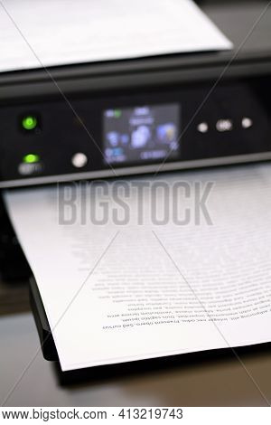 Printed Paper With Lorem Ipsum Text In Modern Inkjet Printer.