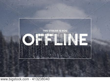 Digitally generated image of this stream is currently offline text against trees on winter landscape. internet streaming template design concept