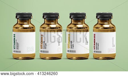 Vitamin injection vial glass bottles on green background