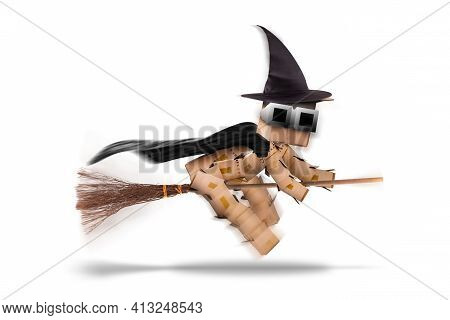 Halloween Witch Character Flying On A Broomstick Or Besom With Witches Hat And Cape. Isolated On A W