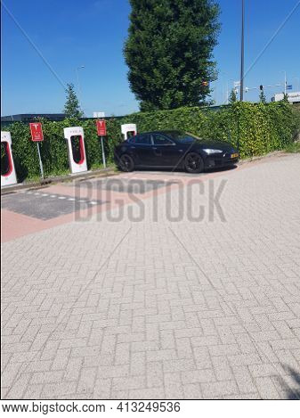 Venlo, Holland - June 28, 2019: 
Electric Car Model Tesla S 75d In The Netherlands At A Tesla Chargi