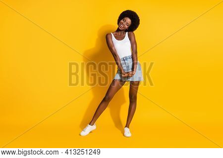 Full Length Body Size View Of Pretty Cheerful Thin Shy Wavy-haired Lady Posing Isolated Over Bright 
