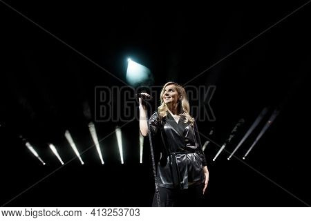 Young Beautiful Woman Singing In Whitel Smoke, Close Up.