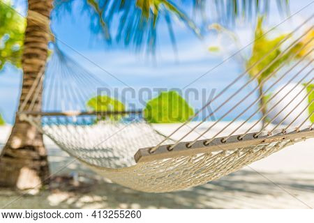 Tropical Beach Paradise As Summer Landscape With Beach Swing Or Hammock And White Sand, Calm Sea For