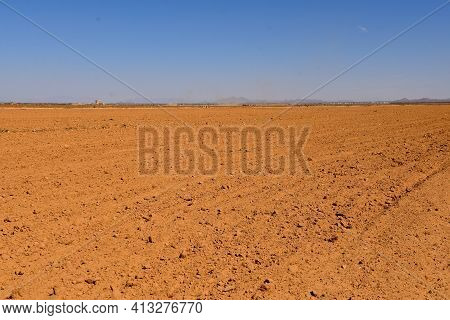 A Sandy Top Soil Field Is Ready For Planting In The Desert Area Of Central Arizona