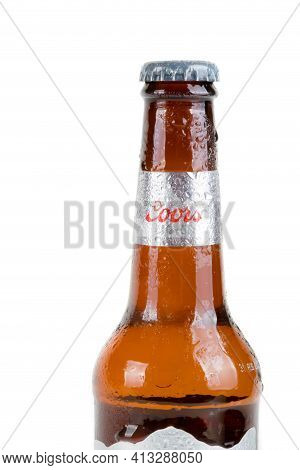 Sandhurst, United Kingdom, 18th March 2021:- A Cold Bottle Of Coors Light Isoalted On A White Backgr