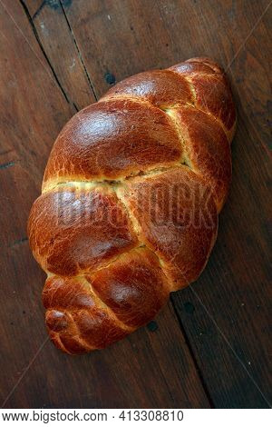 Easter Tsoureki Braid, Greek Easter Sweet Bread, On Wooden Background