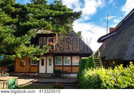 August 17, 2017 Pervalka Village, Lithuania, Old Lithuanian Traditional Wooden House In The Village