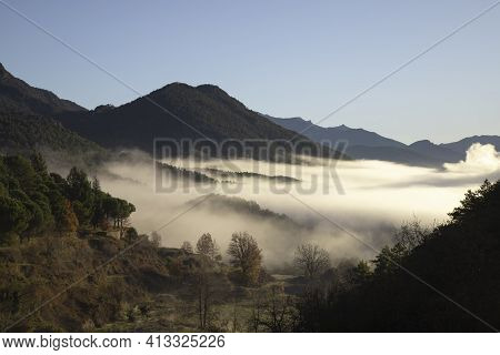 Landscape Showing A Mountain And A Layer Of Fog Over The Forest In Sant Llorens De Morunys In Lord V