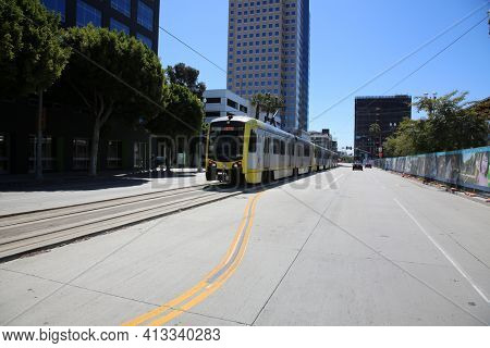 Long Beach, California - USA - March 15, 2021: Los Angeles Metro Blue Line in Downtown Long Beach California. Metrolink Train System transports people around in Southern California. Editorial use only
