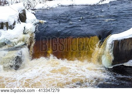 Voitsky Padun Waterfall Is Close-up In February Afternoon. Karelia, Russia