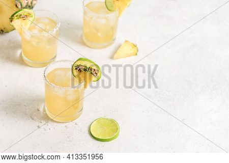 Pineapple Margarita Cocktail. Summer Boozy Refreshing Drink With Tequila, Pineapple In Glasses With 