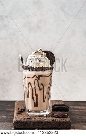 Cold Frappe Coffee  Served With Chocolate Cookies And Whipped Cream. Mudslide Delicious Dessert Coff
