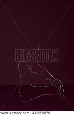 Black Wire On A Red Background As A Symbol Of The Struggle For Freedom And Independence In Countries