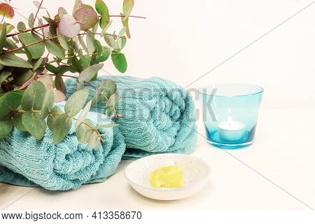 Small Bowl With Cosmetic Moisturizer Or Emollient For Pedicure And Soft Foot Skin, Blue Towels, Cand