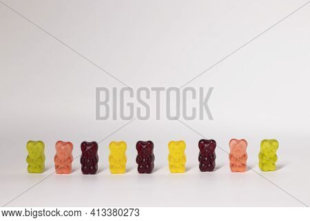 Colourful Sweet Gummy Bears Isolated On White Background.