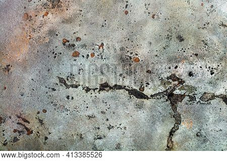 Metal Texture Covered With Old Weathered Swollen Paint With Rust Stains, Scratches And Cracks.