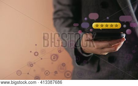 Customer Experiences Concept. Happy Client Using Smartphone To Giving Best Excellent Review Rating F