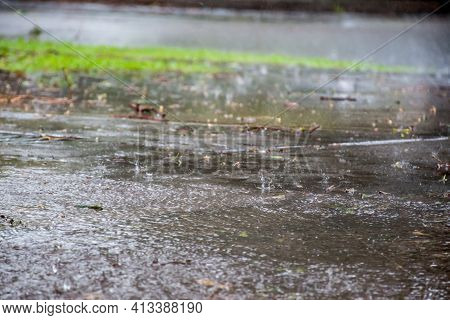 Blurred Defocused Image Of Heavy Torrential Rain. Rainfall Flash Flooding Background. Metorology