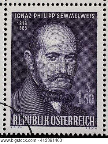 ZAGREB, CROATIA - SEPTEMBER 11, 2014: Stamp issued in Austria shows Ignaz Philipp Semmelweis - Hungarian physician, now known as an early pioneer of antiseptic procedures, circa 1965