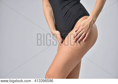 Sexy Woman Touching Smooth Legs After Depilation, Stock Photo
