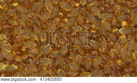 Overhead Shot Of Many Yellow Soft Capsules Or Gelcaps That Are Used For Medicines, Dietary Supplemen