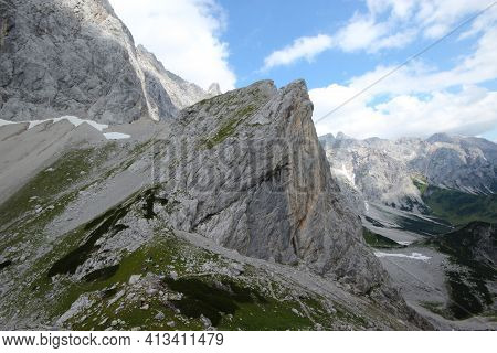 View Of The High Mountain Peaks Of The Vast Austrian Alps.