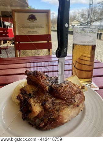 German Cuisine, Schweinshaxe Is A Large Pork Knuckle Roasted Till Crispy On The Outside And Tender I