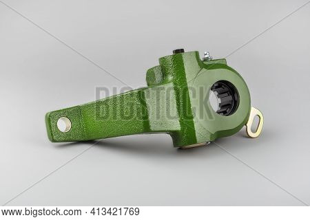 Slack adjuster.Brake slack adjuster on the gray background. Truck parts. Car parts. Parts on the gra