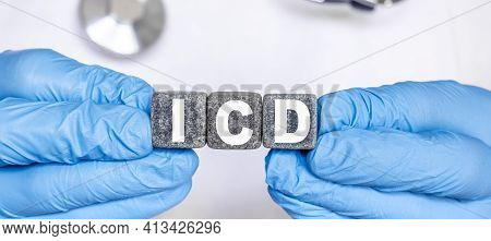 Icd Implantable Cardioverter Defibrillator - Word From Stone Blocks With Letters Holding By A Doctor