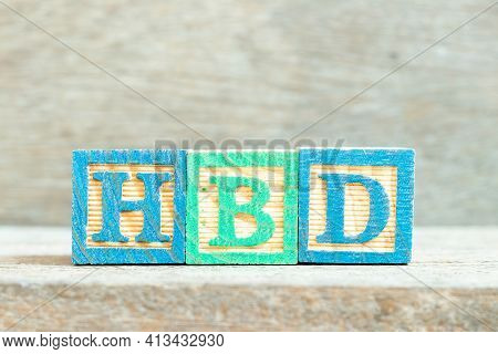 Color Alphabet Letter Block In Word Hbd (abbreviation Of Happy Birthday)  On Wood Background