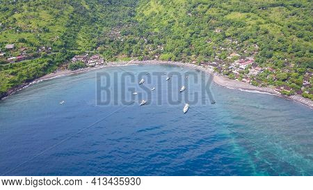 Aerial Drone View From The Sea To The Jemeluk Bay. Amed Is Fast Becoming A Popular Tourist Destinati