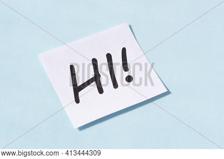 The Word Hi Against Blue Background. Greeting And Welcoming In Hospitality Business Concept.