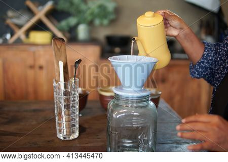 Barista Preparing Brewing Coffee With Coffee Maker And Drip Kettle.