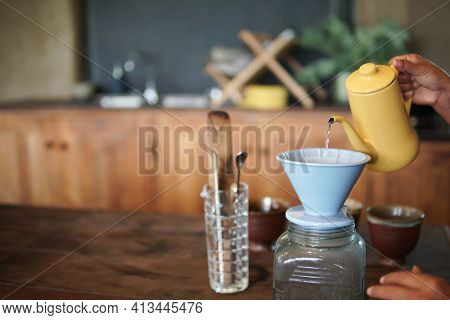 Barista Preparing Brewing Coffee With Coffee Maker And Drip Kettle.