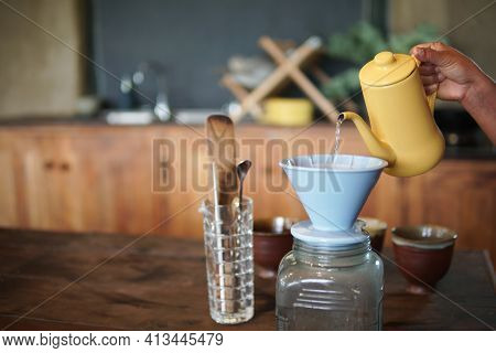 Barista Preparing Brewing Coffee With Coffee Maker And Drip Kettle.