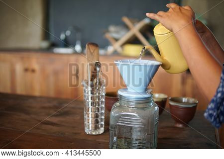 Barista Preparing Brewing Coffee With Coffee Maker And Drip Kettle.